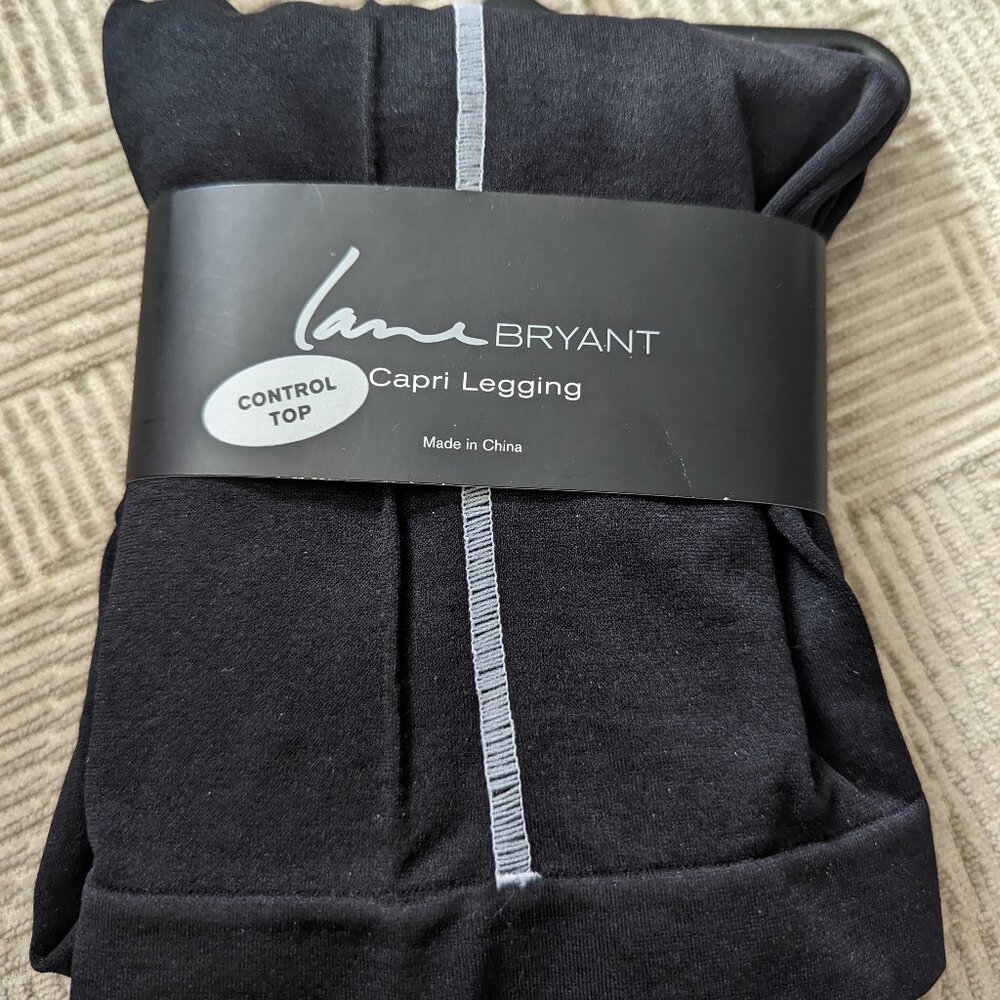 1X Lane Bryant black white stripe on sides.